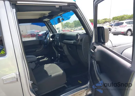 2015 Jeep Wrangler Unlimited Sport z USA, uszkodzony, nr VIN 1C4BJWDG8FL585126